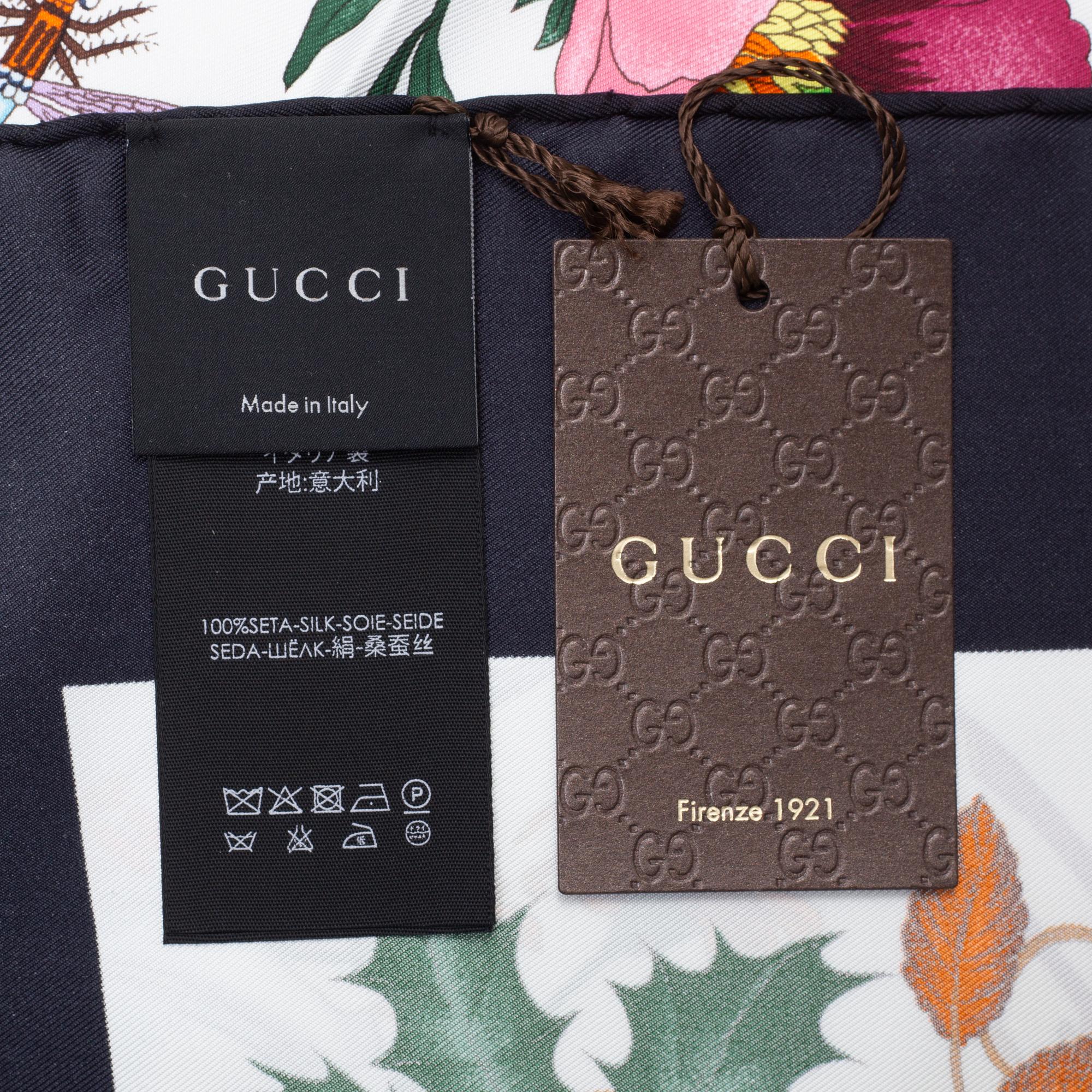 Gucci, a 'Flora' twill silk scarf.