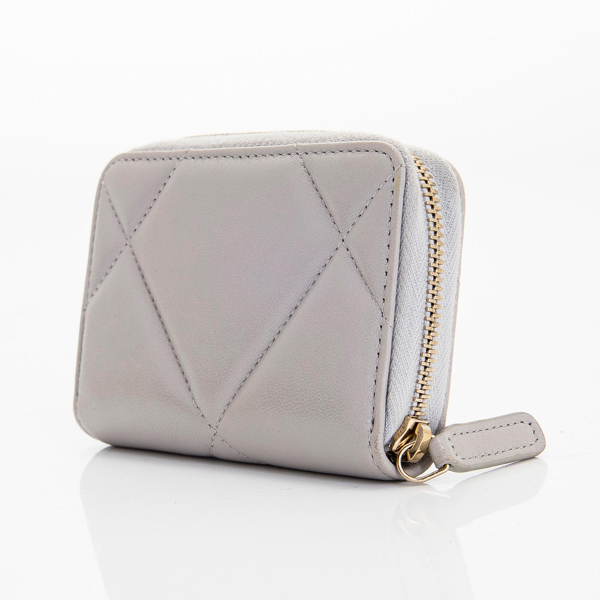 Chanel, A "19 O-coin purse" wallet.