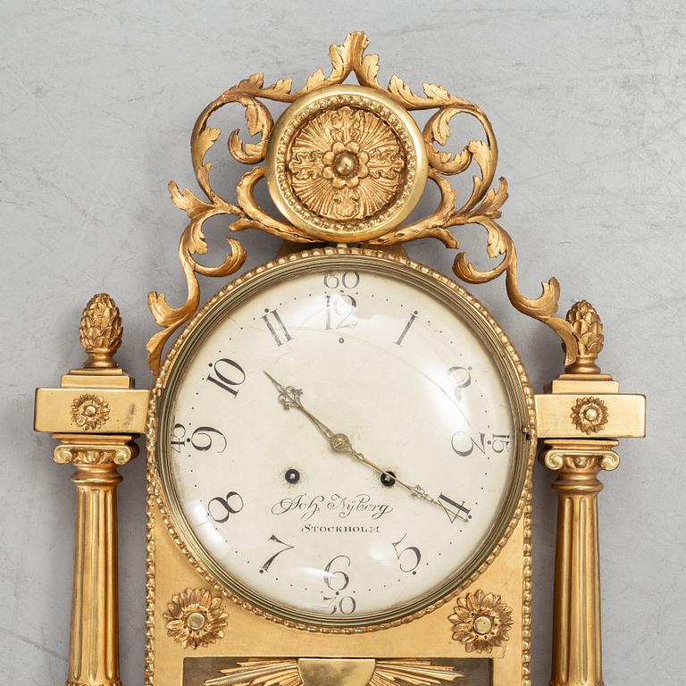 A swedish late gustavian wall clock, Johan Nyberg (Stockholm 1787-1801).