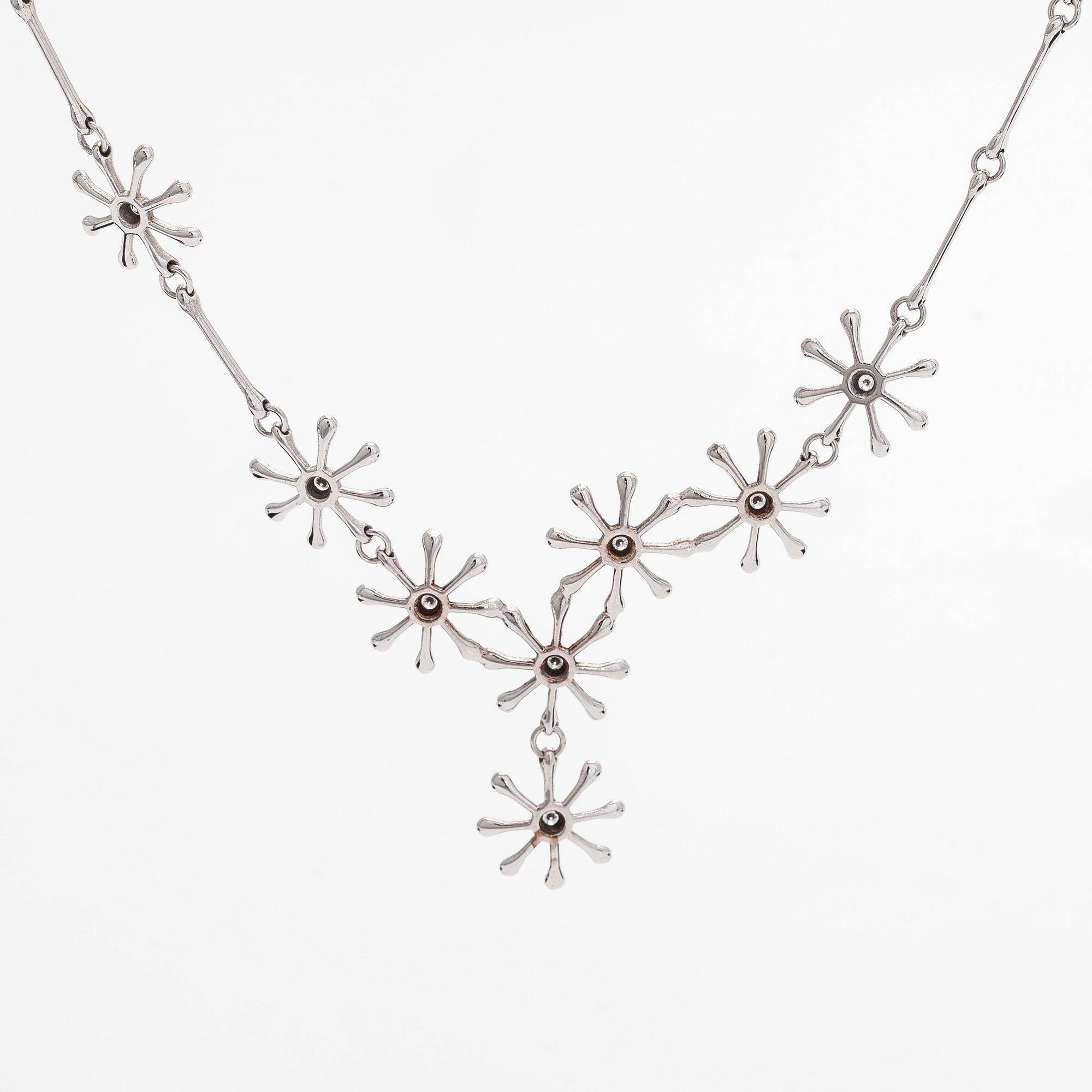 Kalevala Koru, collier, "Polaris", 18K vitguld och briljantslipade diamanter, Kirsti Doukas, 2006.