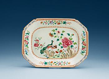 1443. A famille rose 'double peacock' serving dish, Qing dynasty, Qianlong (1736-95).