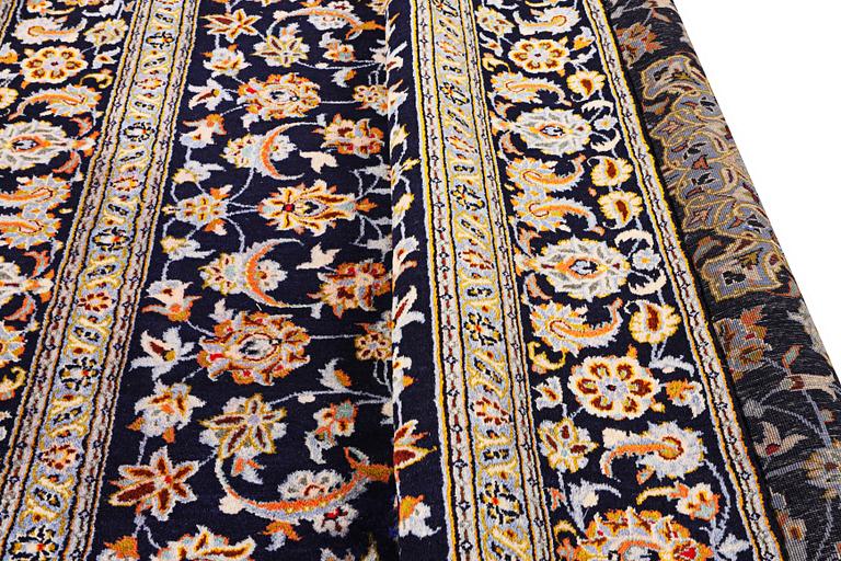 A Kashan carpet, c. 335 x 224 cm.