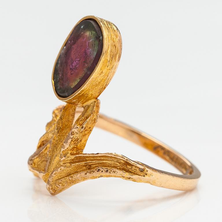 "Pond in the forest", A 14K gold ring with a tourmaline. Lapponia 1971.