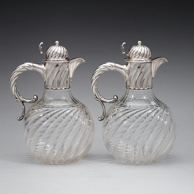 A pair of Swedish 19th century silver and glas jugs, marks of K. Andersson, Stockholm 1893.