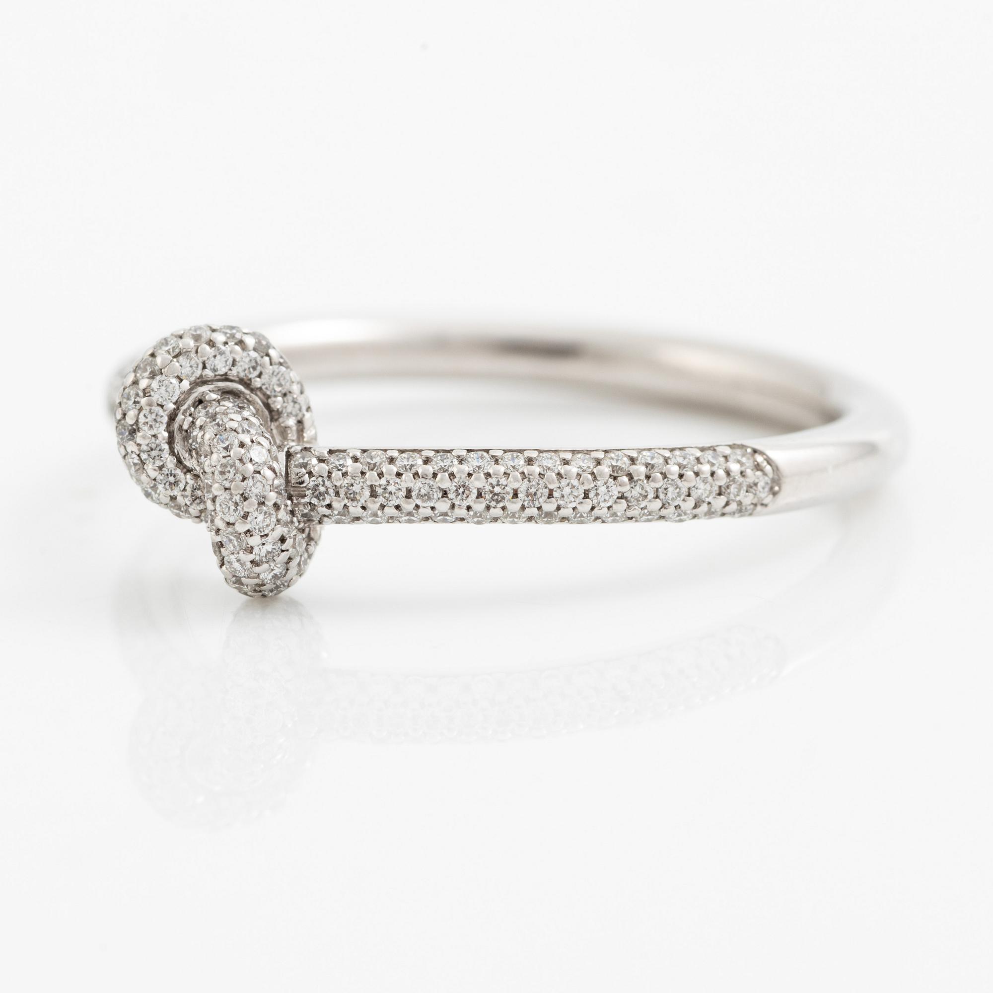 "Engelbert," Legacy Knot Ring Mini Pavé", 18K white gold with brilliant-cut diamonds.