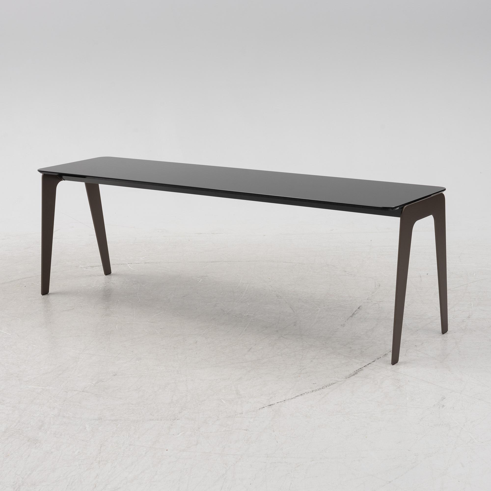 A 'Kirk' glass table by Rodolfo Dordoni for Minotti. 21st Century.