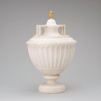 A late Gustavian circa 1800 white marble urn with cover.