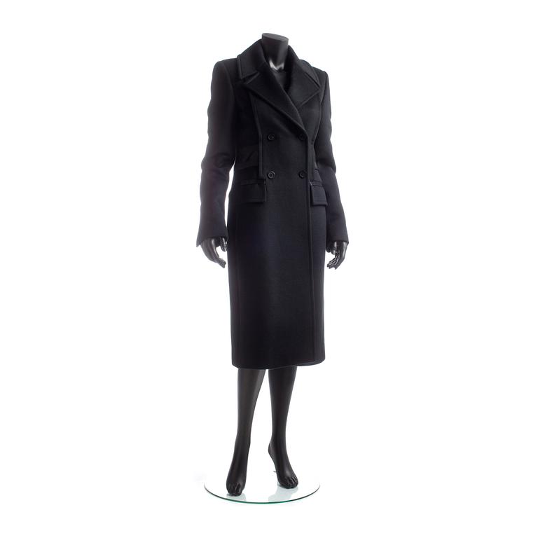 GUCCI, a black wool blend coat.