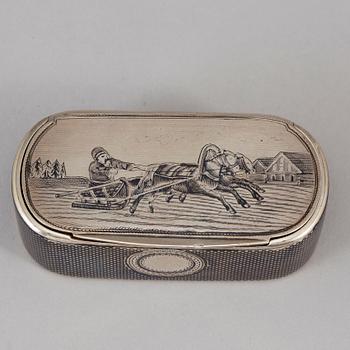 A Russian parcel-gilt silver and niello box, mark of Gustav Klingert, Moskva 1876.