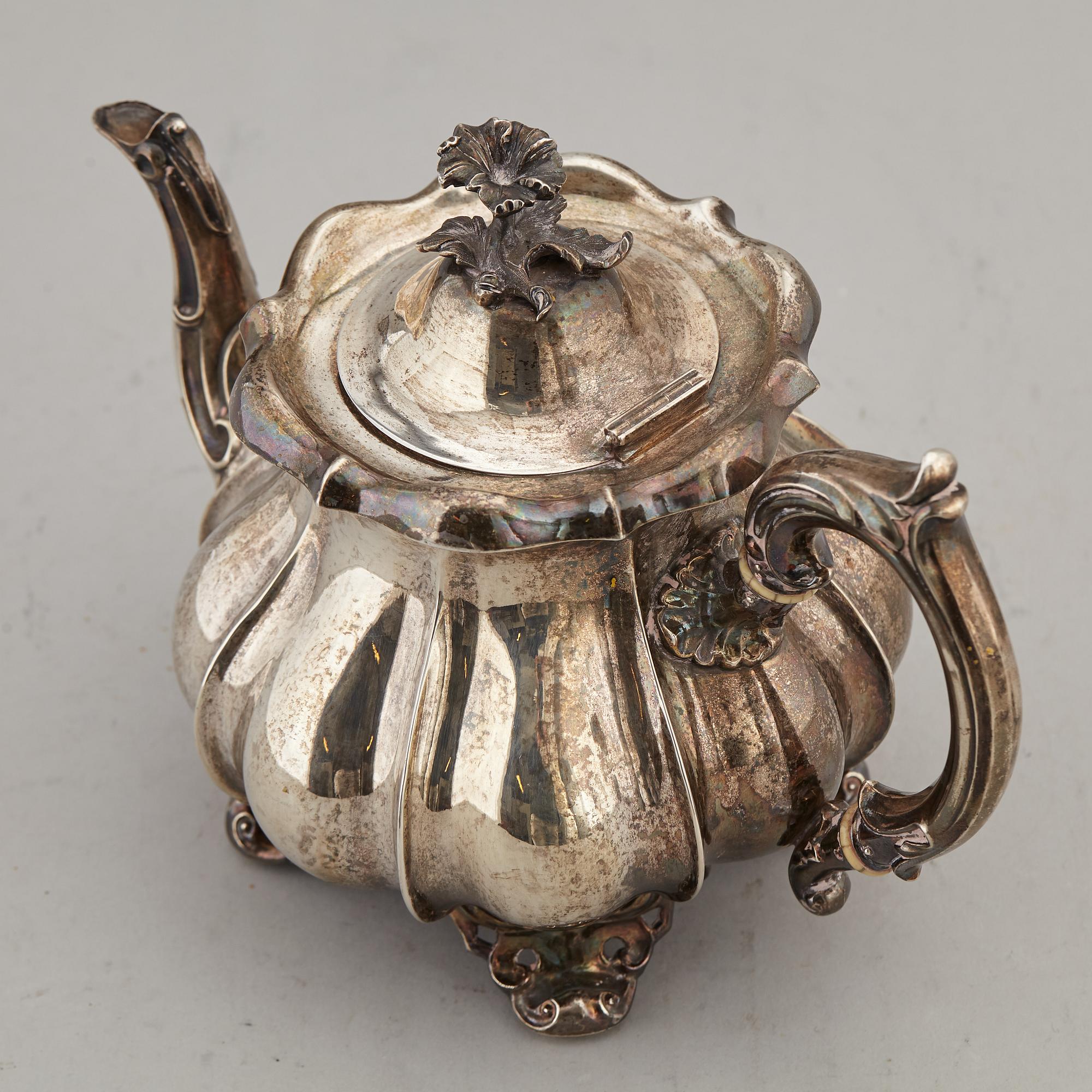 A silver coffee pot by Christian Hammer, Stockholm 1857.