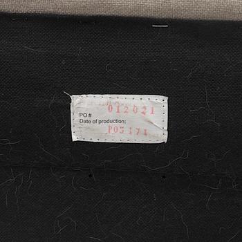 A pair of armchairs, early 21st century.