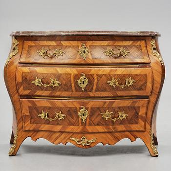 A rococo parquetry and gilt brass-mounted commode attrbuted to M. Engström (master in Stockholm 1758-97).