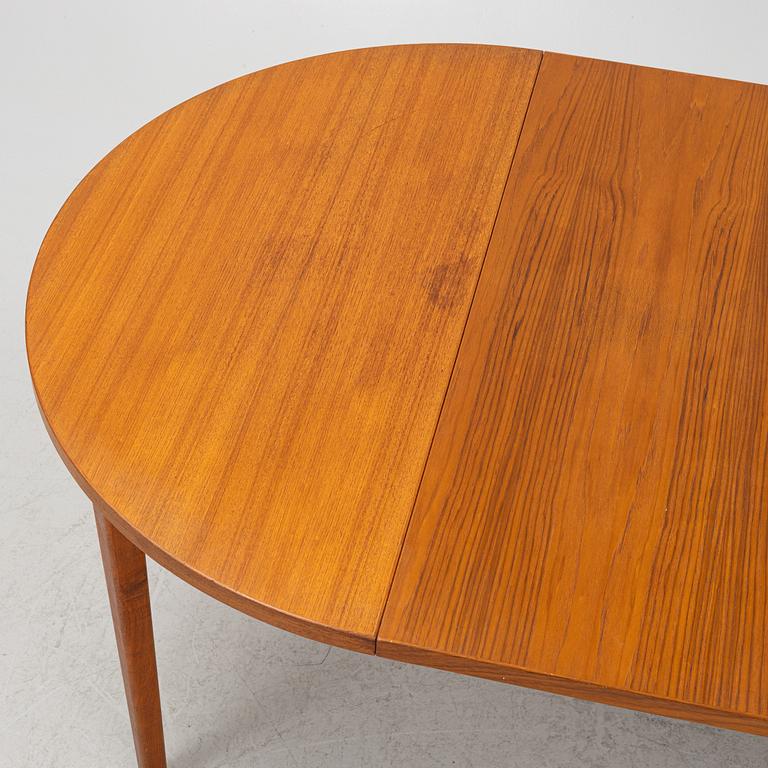 A dining table, mid 20th Century.