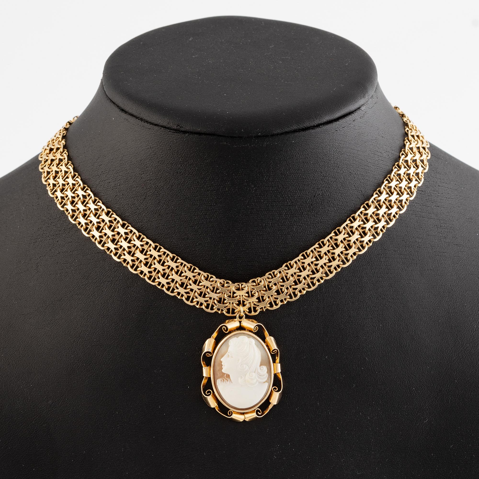 Collier, 18K guld, x-länk med hänge med snäckskalscamé.