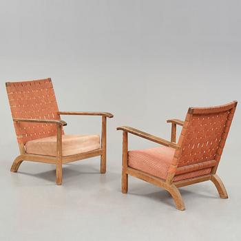 Axel Einar Hjorth, a pair of pine easy chairs, probably model 'Väddö' by Nordiska Kompaniet, Sweden 1930's.