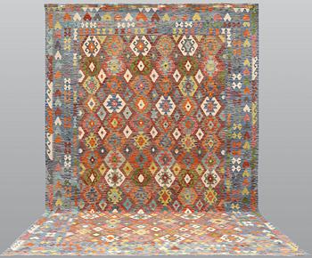 A Kilim carpet, c. 496 x 308 cm.