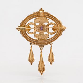 Otto Roland Mellin, A 14K gold brooch/pendant "Memory" with cultured pearls and an amethyst. Kalevala Koru, Helsinki 199.