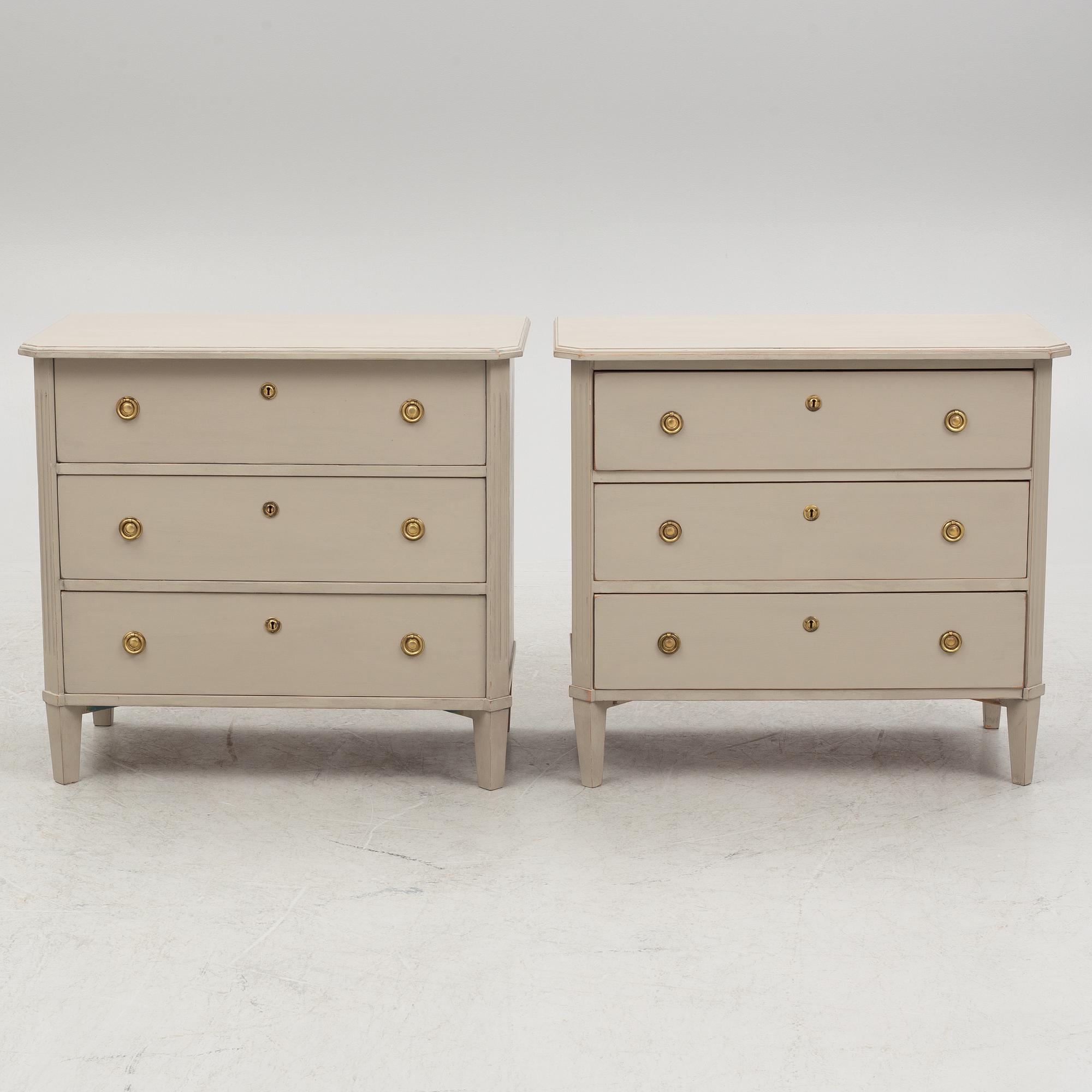 A pair of Gustavian style chest of drawers, mid 20th Century.