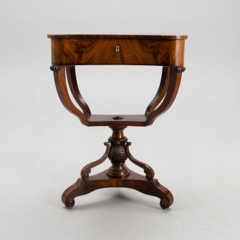 A sewing table from the first half of the 19th century.