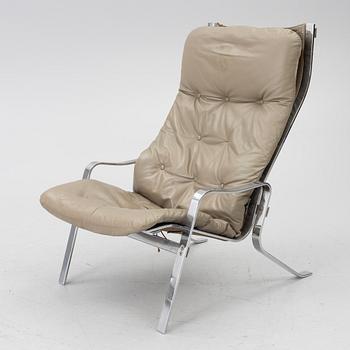 Erling Revheim, fåtölj samt fotpall "Relax", Hove möbler 1970-tal.