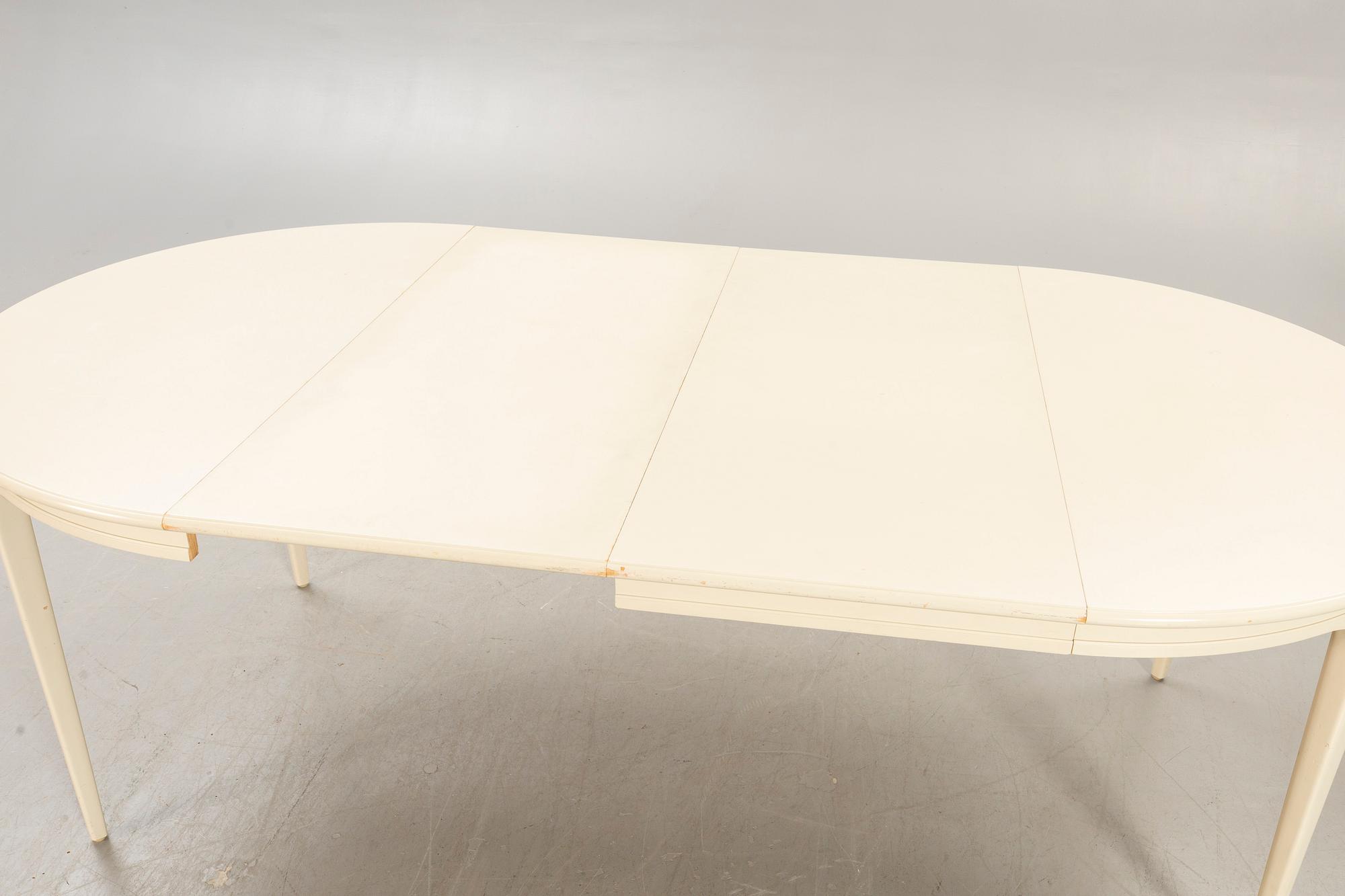 Svante Skogh, dining table plus 2 extension leaves, 4 chairs, second half of the 20th century.