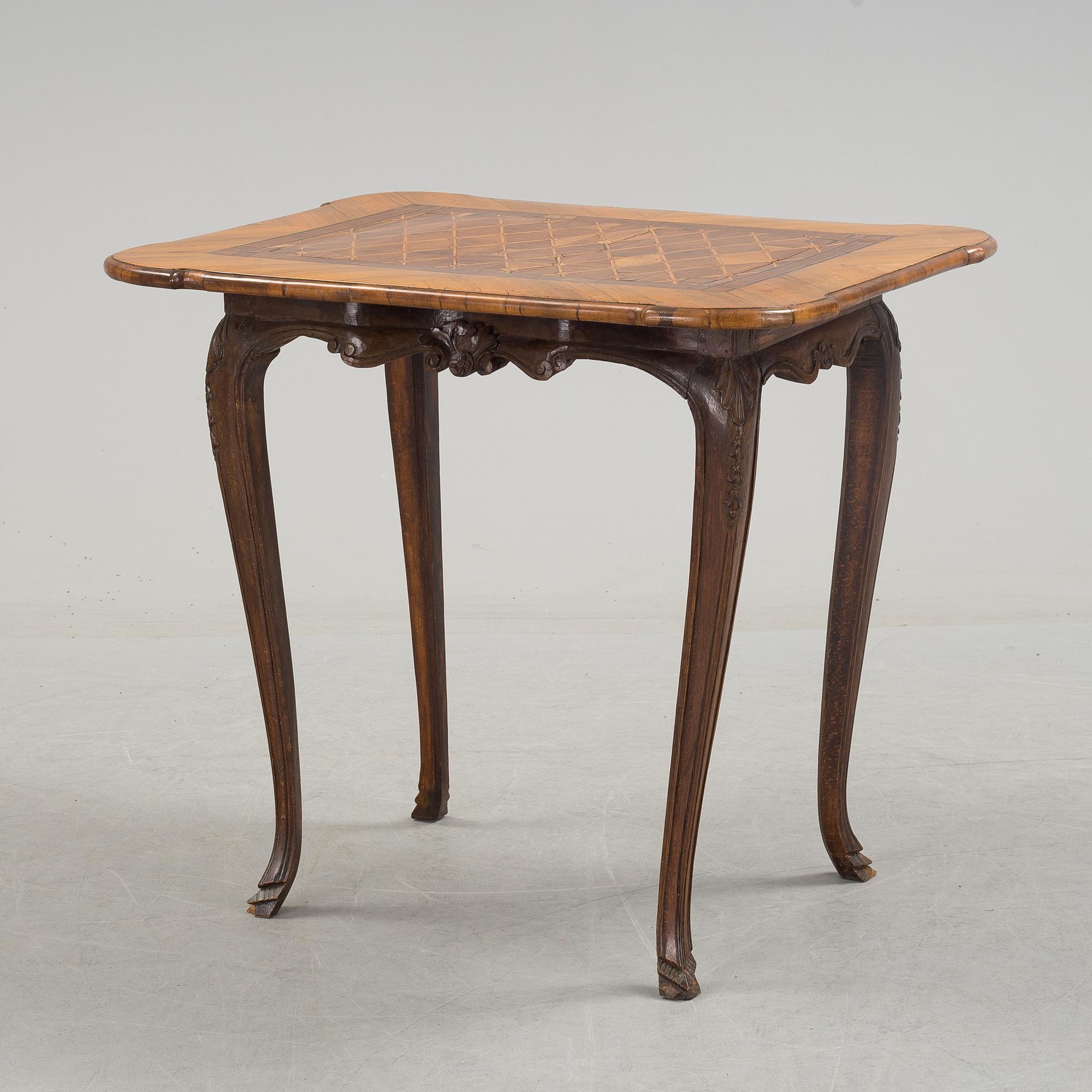 A mid 18th century rococo table.