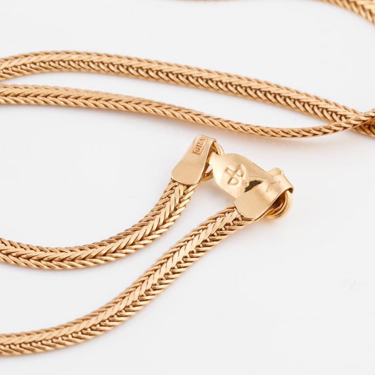 A YELLOW GOLD NECKLACE MADE BY BALESTRA IN ITALY.