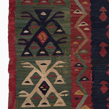 An antique Sarköy kelim, ca 239 x 214 cm.