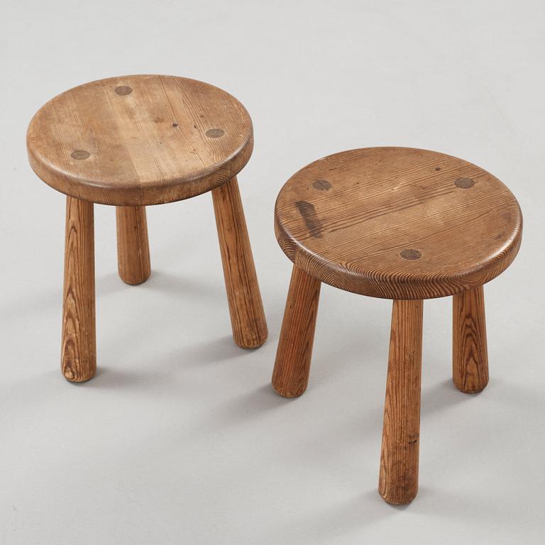 A pair of Axel Einar Hjorth 'Utö' pine stools, Nordiska Kompaniet, 1930's.