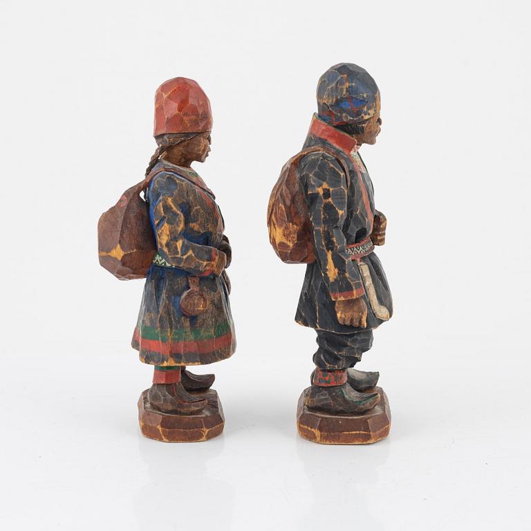 Torborg Lindberg-Karlsson, a pair of figurines, carved and painted wood, signed TL.