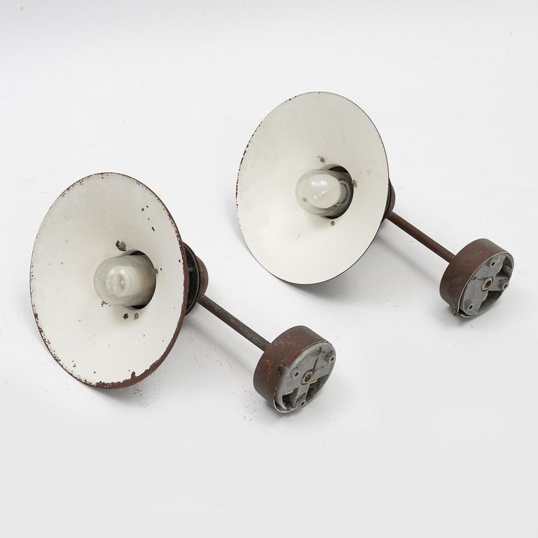Alfred Homann & Ole Kjaer, a pair of 'Nyhavn' wall lamps, Louis Poulsen, Denmark, second half of the 20th century.