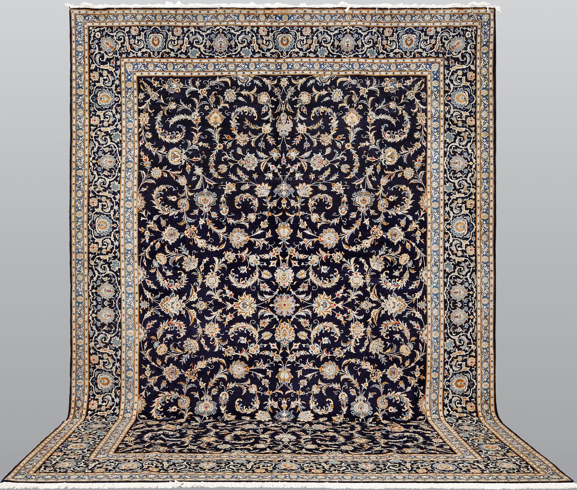 A Keshan carpet, c. 450 x 322 cm.