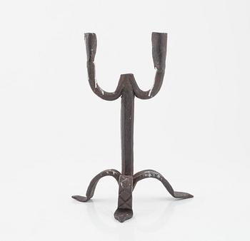 A wrought-iron two-light candlestick, 19th/20th Century.