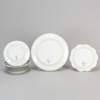 ROYAL COPENHAGEN, eight 'Musselmalet' helblonde  porcelain plates and dishes,  Denmark.