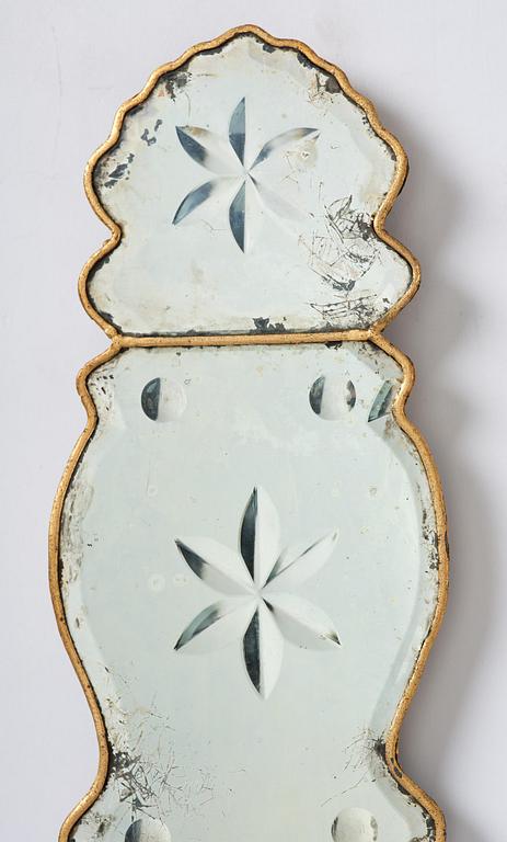 A pair of Swedish late Baroque one-branch girandole mirrors, mid 18th century.