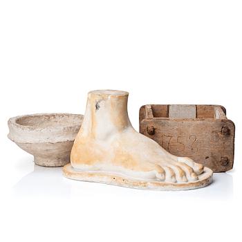 A mixed lot comprising a sculpture, a 19th century wooden cheese mold and a painted papier maché bowl.