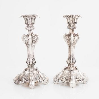 A Pair of Swedish Rococo-Revival Silver Candlesticks, Gustaf Möllenborg, Stockholm 1843-46.