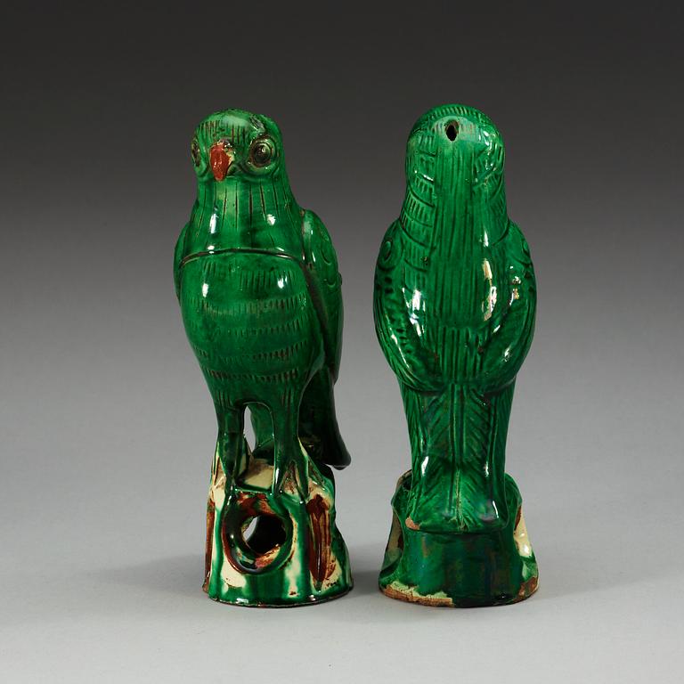 A set of two green glazed falcons, Qing dynasty.