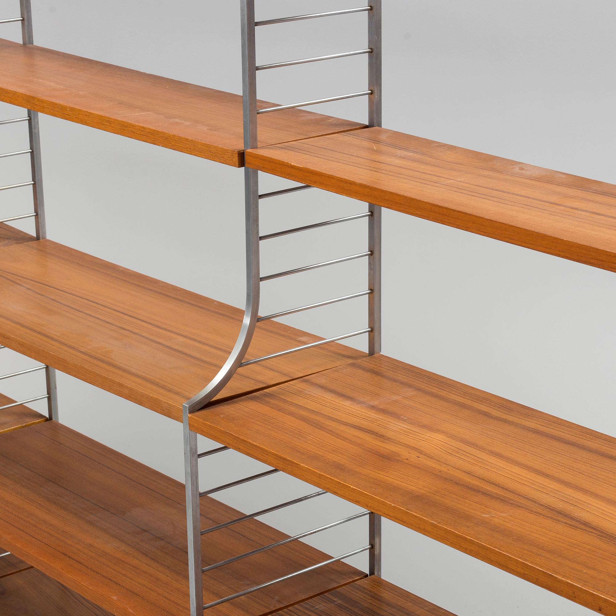 A 1950s "String" four-section book shelf by Nils Strinning.