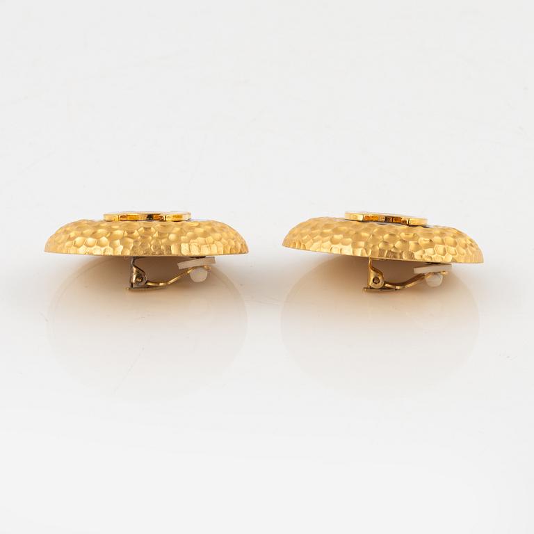 Chanel, a pair of gold tone clip-on earrings, 1990-1992.