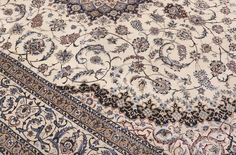 A Nain part silk carpet, 407 x 304 cm.