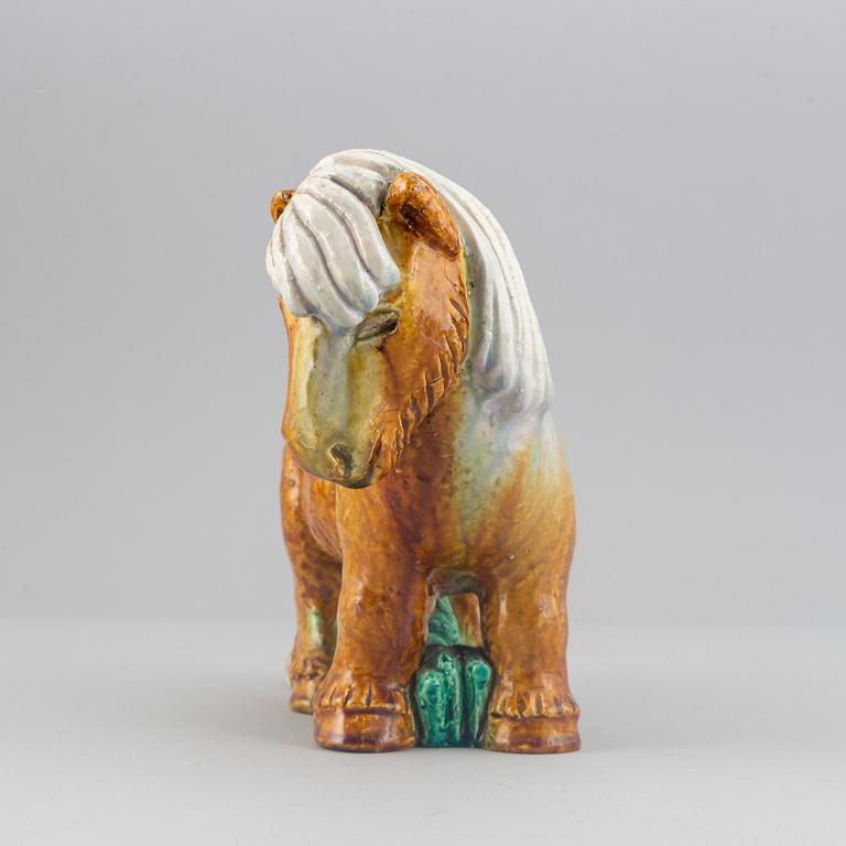 Gunnar Nylund, a stoneware sculpture of a work horse for Rörstrand signed.