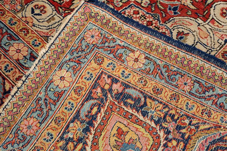 A carpet, semi-antique Tabriz, ca 357,5 x 253,5-263 cm.