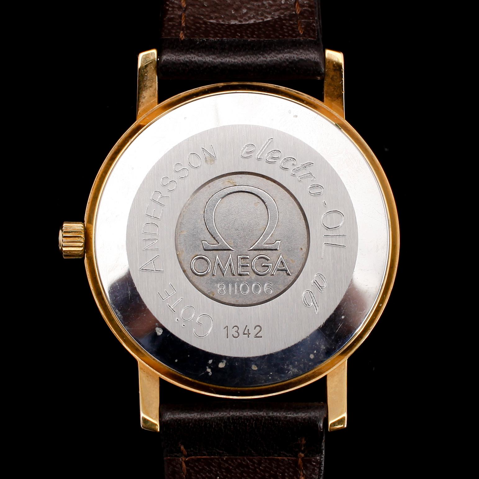 HERRARMBANDSUR, guld på stål, Omega Quartz.