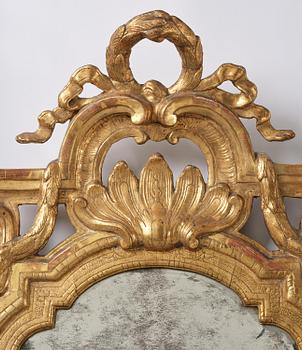 A Trasitional giltwood mirror by J. Åkerblad (master in Stockholm 1758-99).