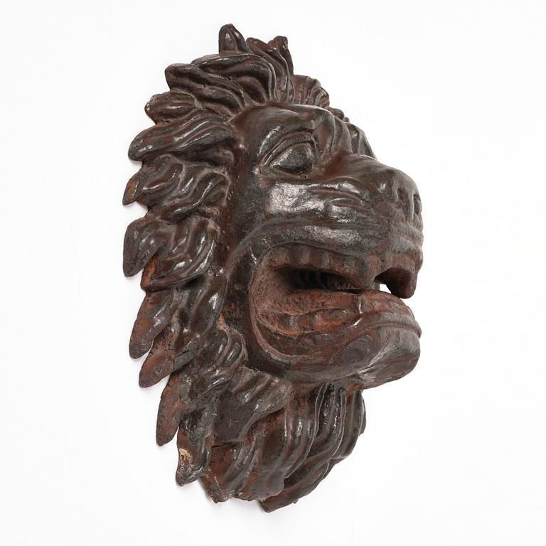 Anna Petrus, a cast iron mascaron in the shape of a lion's head, Näfveqvarns bruk, ca 1927, Swedish Grace.