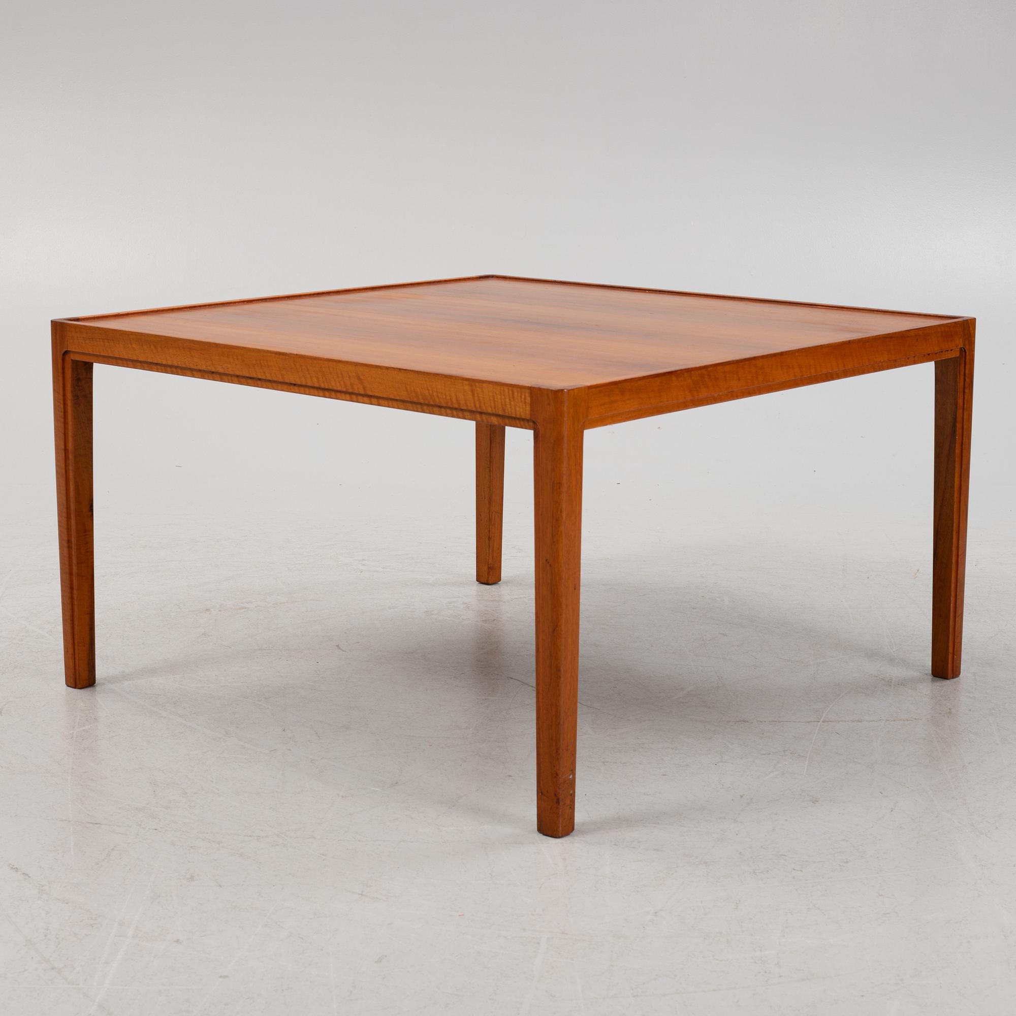 A walnut veneered coffee table, Nordiska Kompaniet, 1958.