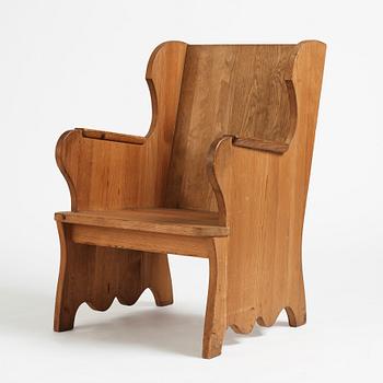 Axel Einar Hjorth, probably, a stained pine "Lovö" armchair, Nordiska Kompaniet, Sweden.