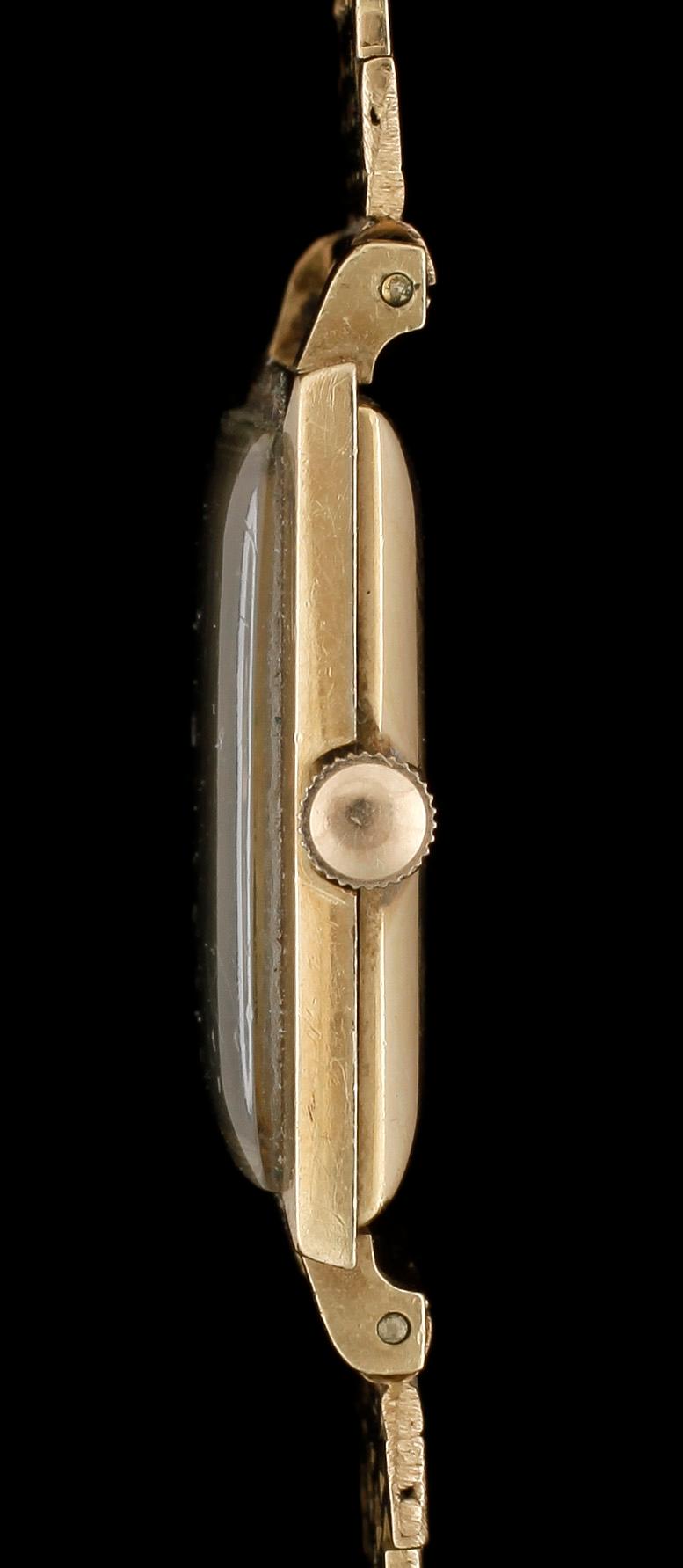 ARMBANDSUR, Credos, 18K guld, ca 1960-70-tal. Total vikt ca 52,5g.