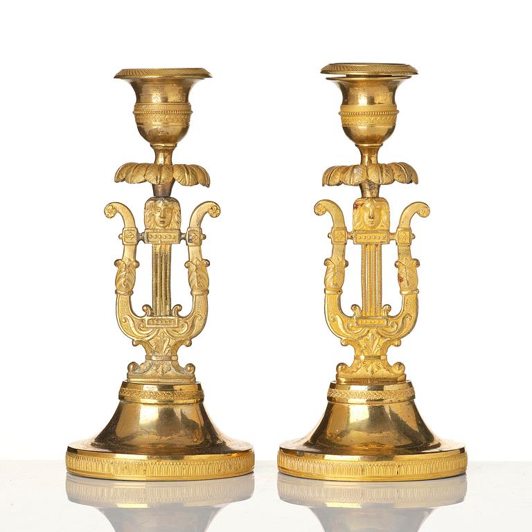 A pair of Swedish Empire ormula candlesticks.